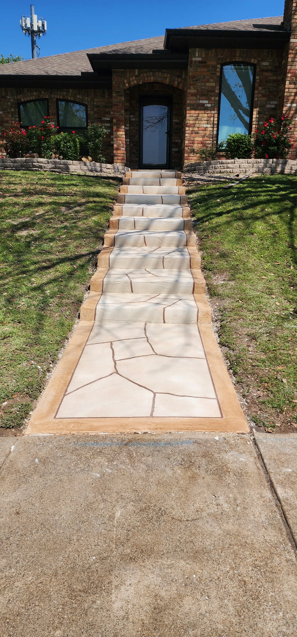 Walkway finished with a stone-look concrete overlay